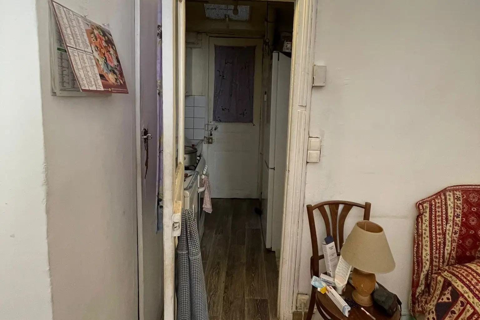 Vue de la cuisine avant rénovation du projet Paris 16ème